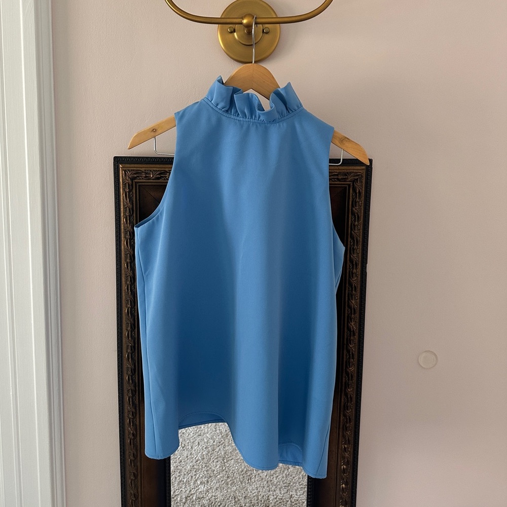 Tuckenuck Mason top. Blue, standing ruffle collar, bow tie back. Like new.